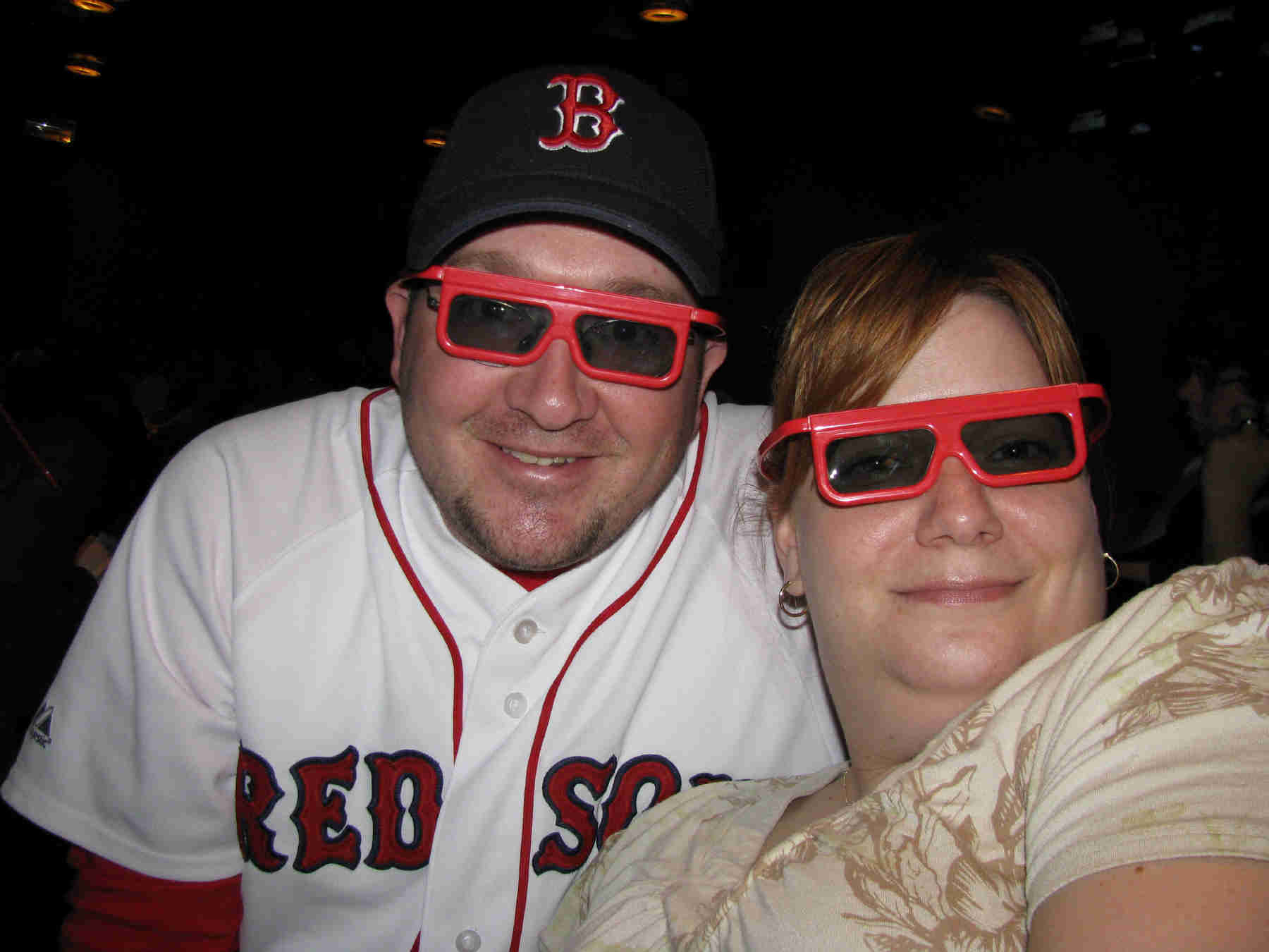 Dan and Wife Heather wearing fun red framed glasses