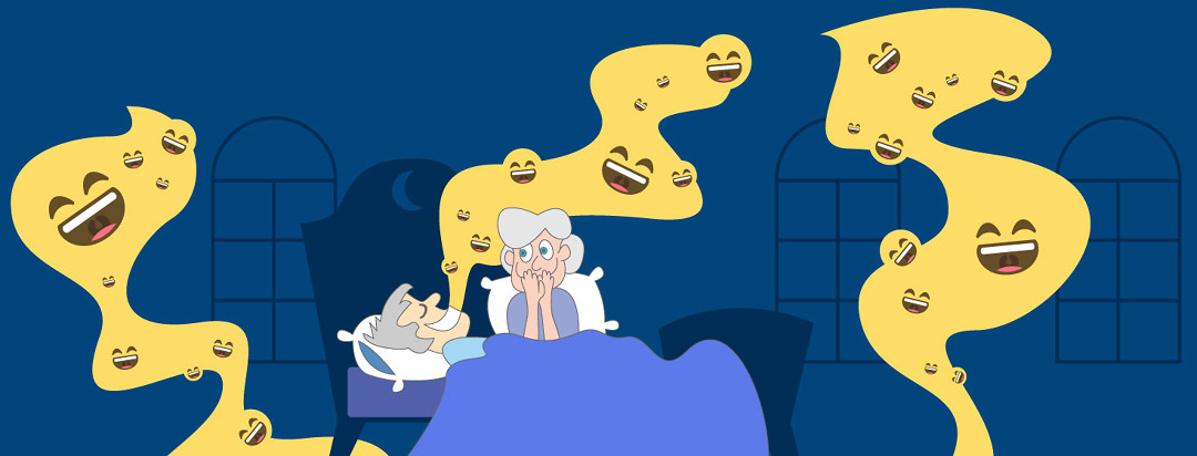 A woman watching her husband sleep next to her while smiley face emoji's fill the air around him as he giggles while he's sleeping.