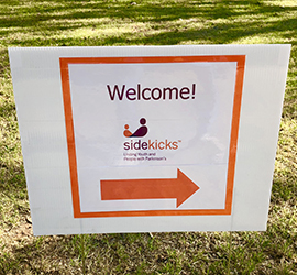 A sidekicks welcome sign