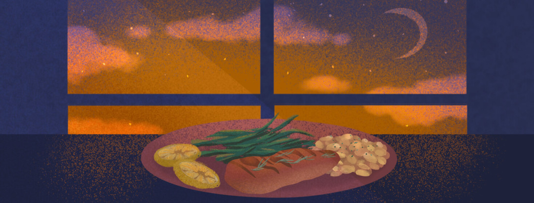 Dinner plate featuring high protein meal of steak, beans, green beans, and lemon slices in front of night sky window.