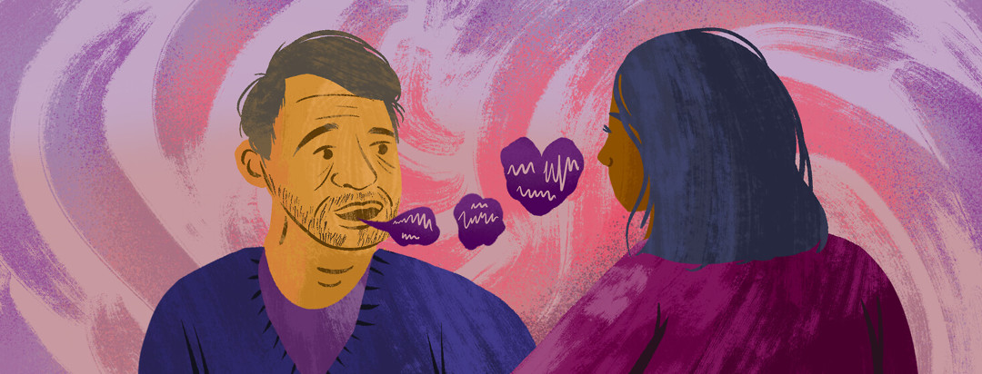 Latino man shakily speaks words in the shape of hearts to his caregiver