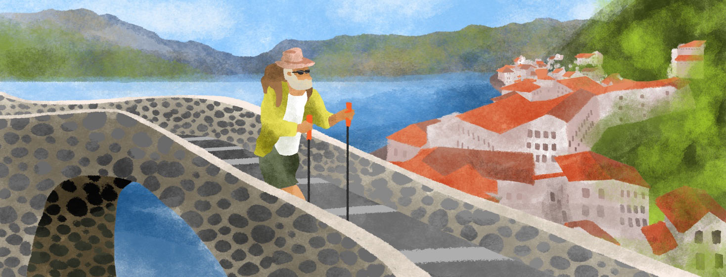a man walk across a European bridge having adventure travel and parkinson's disease