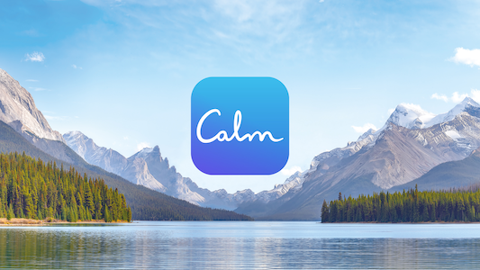 Calm app logo between mountains